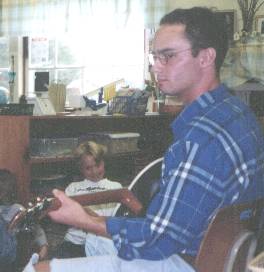 Josh Pratt plays 
guitar for Cerulean Fox class at GFS